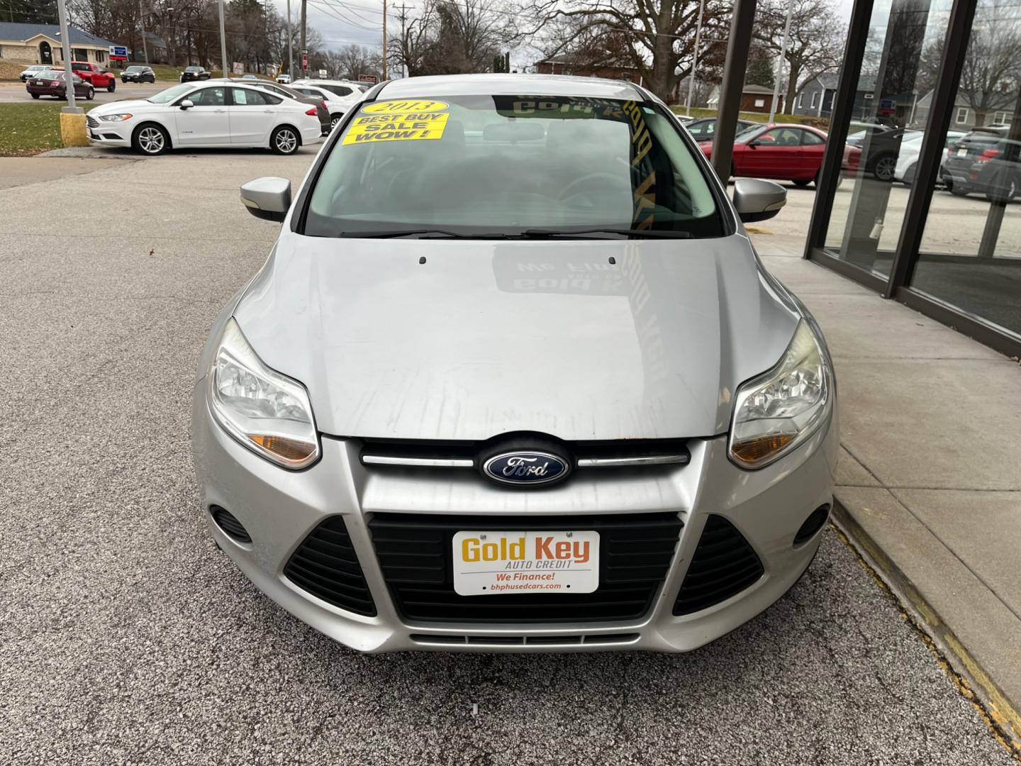 2013 Ingot Silver Metalli Ford Focus SE Sedan (1FADP3F28DL) with an 2.0L L4 DOHC 16V engine, located at 1633 W Kimberly, Davenport, IA, 52806, (563) 323-5341, 41.559456, -90.598732 - Photo#1